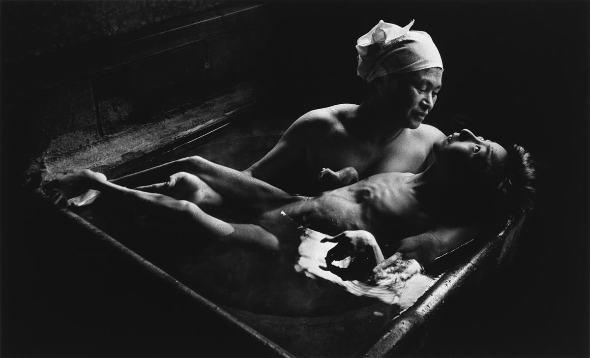 W. EUGENE SMITH (1918-1978) Tomoko Uemura in her Bath.